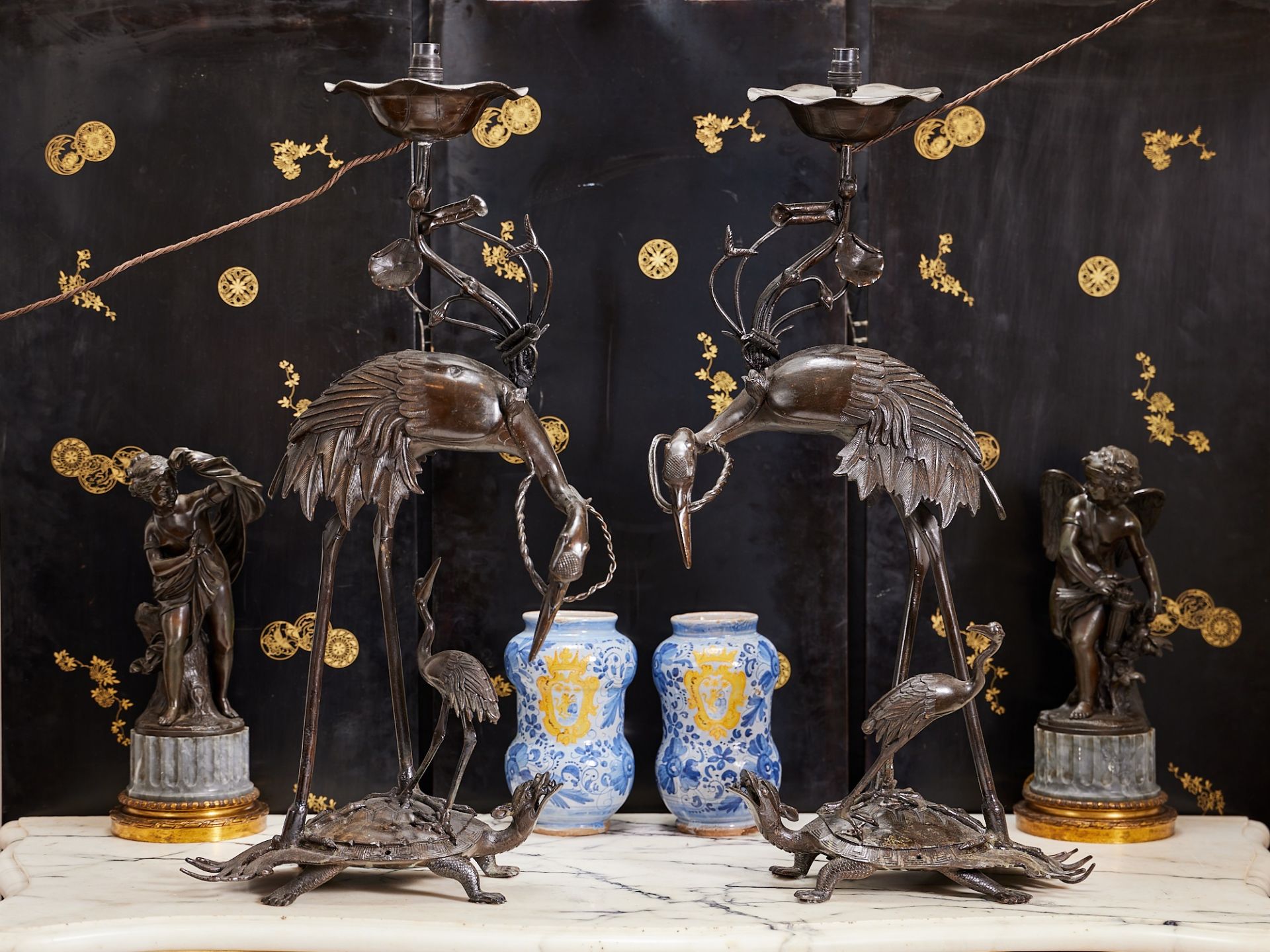 A PAIR OF JAPANESE MODELS OF STORKS FITTED AS LAMPS