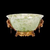 A SILVER GILT AND DIAMOND MOUNTED HARDSTONE BOWL IN THE STYLE OF FABERGE