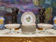 MEISSEN: A 19TH CENTURY RETICULATED PORCELAIN DESSERT SERVICE DECORATED WITH BIRDS