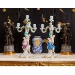 MEISSEN: A PAIR OF 19TH CENTURY PORCELAIN FLOWER ENCRUSTED AND FIGURAL CANDELABRA