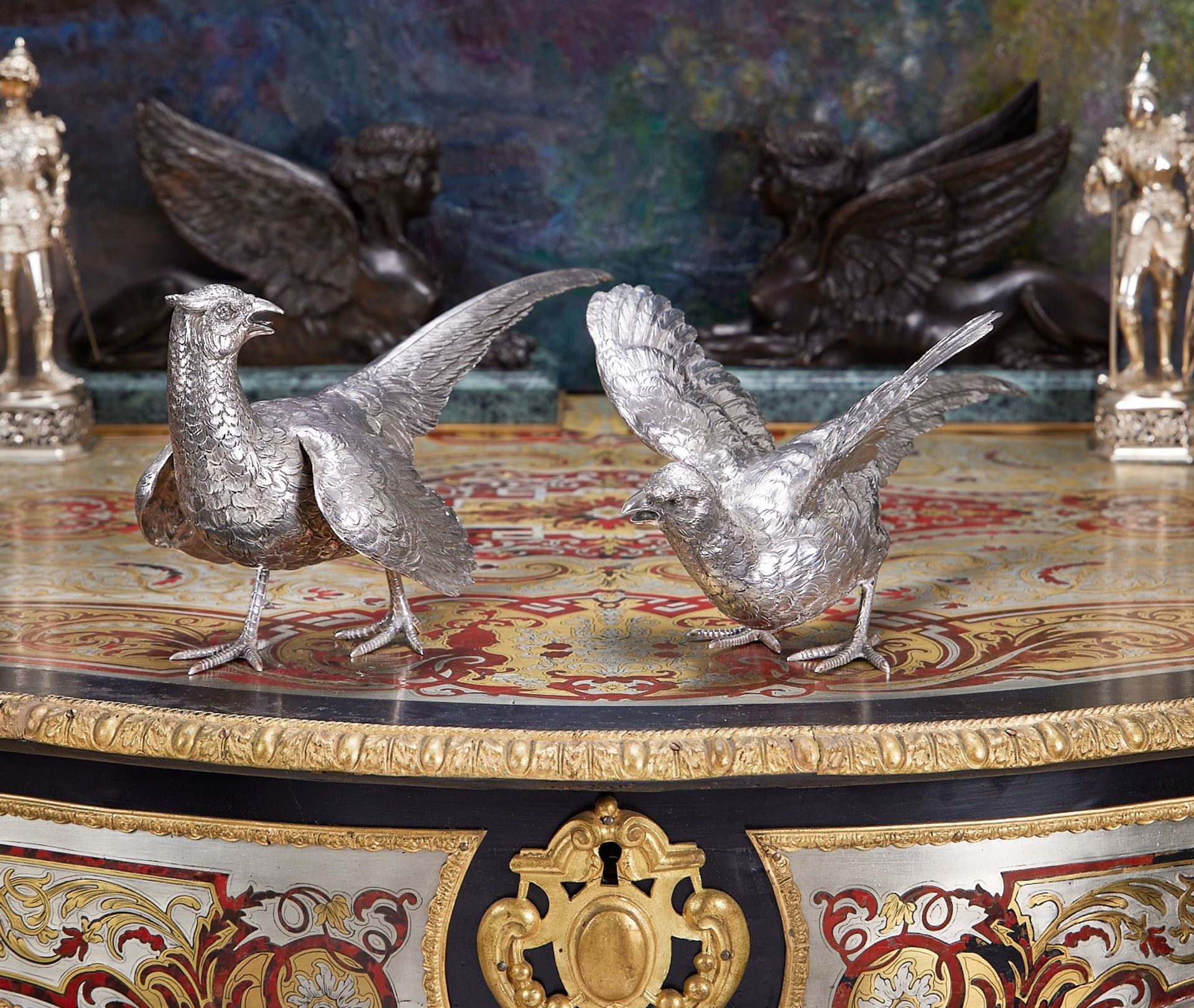 A PAIR OF STERLING SILVER MODELS OF PHEASANTS, GERMAN, EARLY 20TH CENTURY