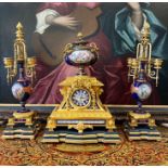 AN EXCEPTIONAL QUALITY LATE 19TH CENTURY FRENCH ORMOLU AND SEVRES STYLE PORCELAIN CLOCK SET