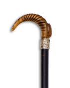 A RHINOCEROS HORN HANDLED WALKING CANE, LATE 19TH CENTURY