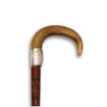 A RHINOCEROS HORN HANDLED WALKING CANE, LATE 19TH CENTURY