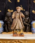 A RARE 18TH CENTURY ITALIAN POLYCHROME DECORATED FIGURE OF AN OTTOMAN