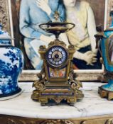 A LATE 19TH CENTURY FRENCH PORCELAIN MOUTED ORMOLU MANTEL CLOCK