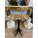 A REGENCY PAINTED MAHOGANY GAMES TABLE