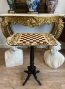 A REGENCY PAINTED MAHOGANY GAMES TABLE