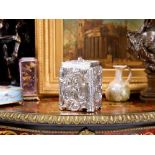 A FINE MID 18TH CENTURY STERLING SILVER CHINOISERIE TEA CADDY, C. 1753