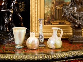 FOUR ANCIENT ROMAN GLASS VESSELS