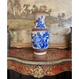 A LATE 19TH CENTURY CHINESE BLUE AND WHITE CRACKLE GLAZED PORCELAIN VASE