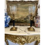 A PAIR OF REGENCY STYLE BRASS HURRICANE LAMPS