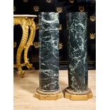 A FINE PAIR OF 19TH CENTURY ITALIAN VERDE ANTICO SOLID MARBLE AND ORMOLU MOUNTED COLUMNS