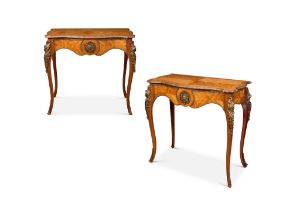 A PAIR OF EARLY 20TH CENTURY KINGWOOD SERPENTINE TABLES