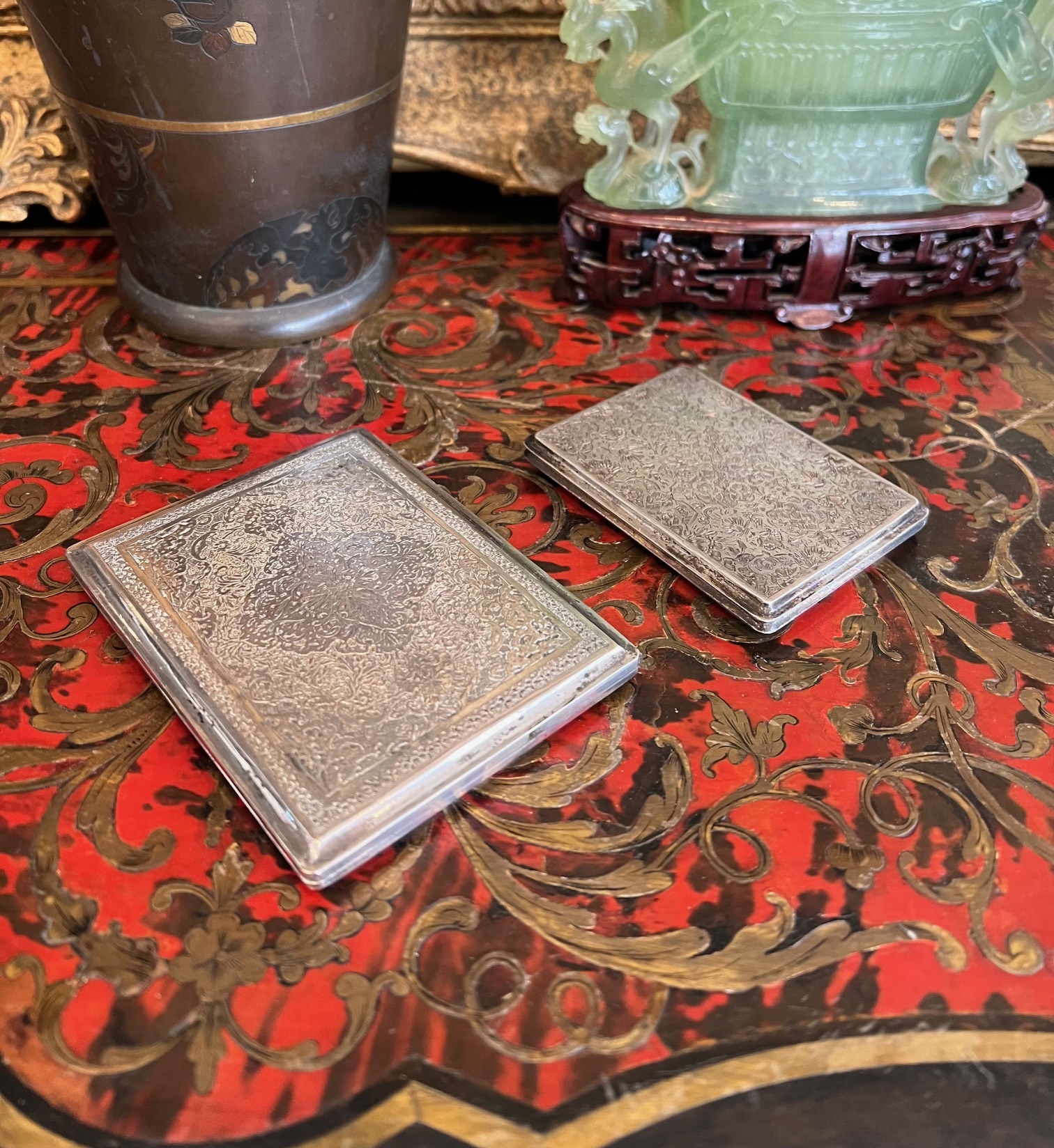 TWO PERSIAN SILVER CIGARETTE CASES