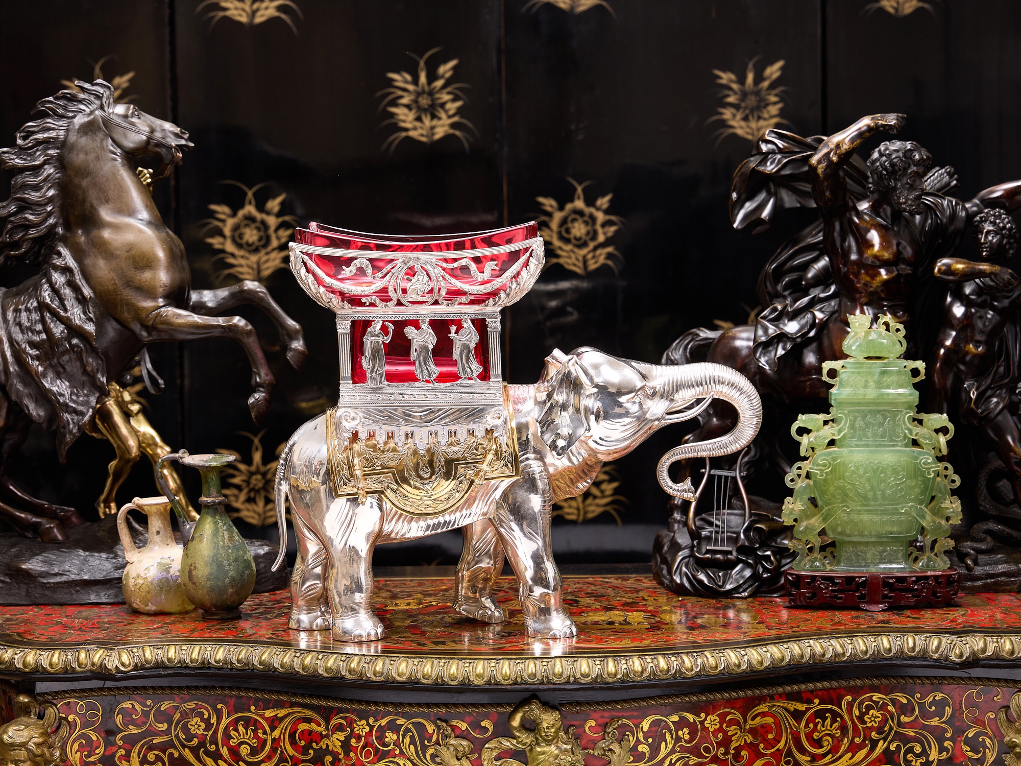 A LARGE SILVER, SILVER GILT AND RUBY GLASS ELEPHANT VASE, GERMAN, 20TH CENTURY