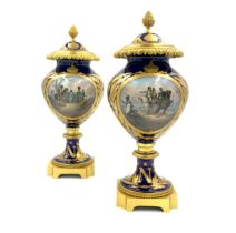 A FINE PAIR OF LATE 19TH / EARLY 20TH CENTURY SEVRES STYLE PORCELAIN NAPOLEON VASES