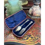 A 19TH CENTURY CASED SILVER FORK AND SPOON, LONDON, 1860