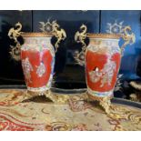 A PAIR OF EARLY 20TH CENTURY JAPANESE VASES WITH ORMOLU MOUNTS