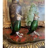 A PAIR OF LATE 19TH CENTURY SILVERED AND GILT METAL AND GLASS COCKATOO JUGS