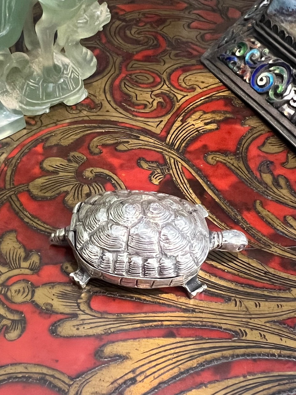 A CONTINENTAL SILVER TORTOISE PILL BOX