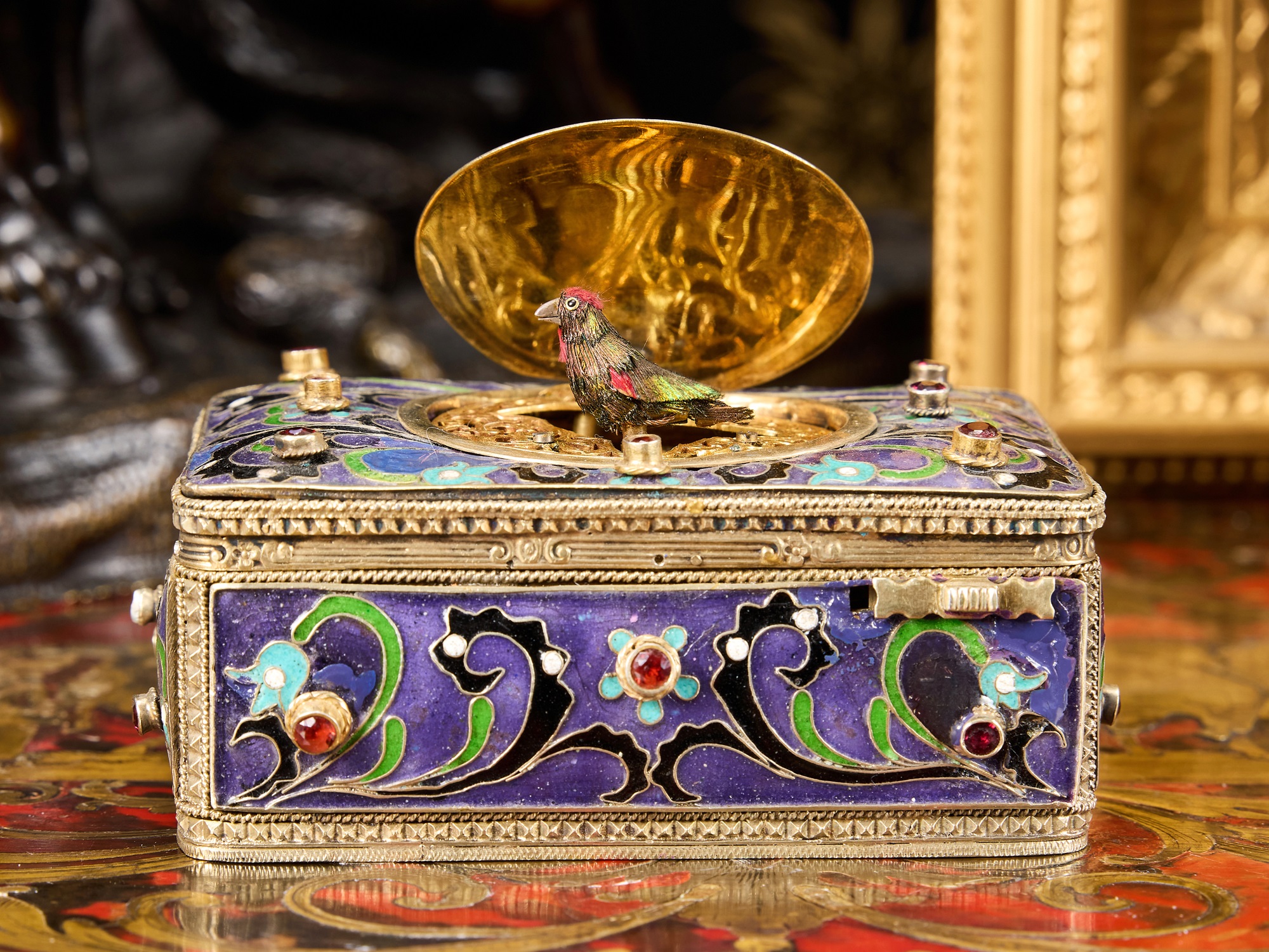 A 1920'S GERMAN SILVER GILT AND ENAMEL SINGING BIRD BOX