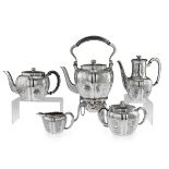 ODIOT: AN EXCEPTIONAL 19TH CENTURY FRENCH SOLID SILVER FIVE PIECE TEA SERVICE C. 1880