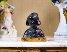 RUTH MILLES (SWEDISH, 1873-1941): BUST OF A BRETON GIRL