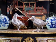 A LARGE PAIR OF SILVER MODELS OF GAME BIRDS