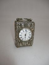Victorian Embossed Silver Case Bedside Clock having a French Movement, London 1891