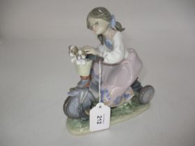 Lladro Figure of a Girl and a Puppy on a Trike, 5680
