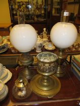 Three Oil Lamps and a Brass Lamp Holder