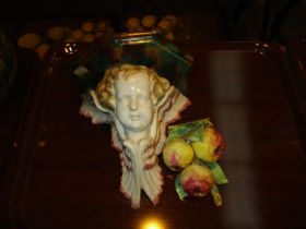 Victorian Majolica Pottery Cherub Head Wall Bracket and a Fruit Plaque