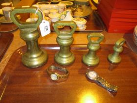 Four Brass Bell Weights and 2 Ladies Citizen Eco Drive Watches