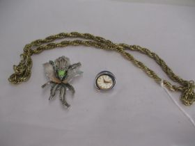 Gruen Enamel Case Pendant Watch, Enamel and Marcasite Brooch and a Necklace