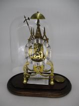 Brass Skeleton Clock with Fusee Movement, Under a Glass Dome, total height 42cm