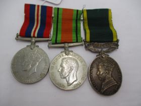 Two WWII Medals and Efficiency Medal to 6334975 Pte. E.J. Adams R.A.O.C