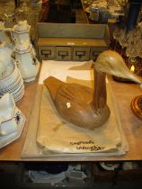 Carved Wood Duck, Shelf Drawers and Damask Table Cloths