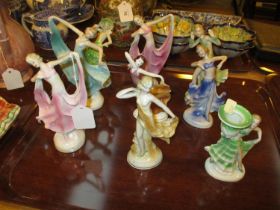 Nine Art Deco Porcelain Figures