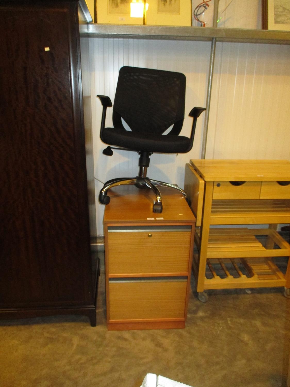 Filing Cabinet with Keys and a Desk Chair