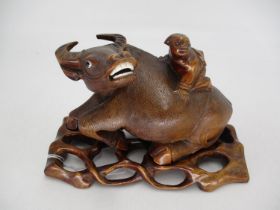 Chinese Carved Wood Buffalo on a Stand, 24cm long