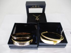 Four Halcyon Days Gold Plated Bangles, and a Pendant, in Fitted Cases