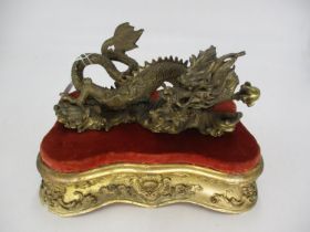 Chinese Bronze Dragon, 22cm long, on a Gilded Stand