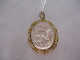 Carved Cameo Pendant Brooch in a Yellow Metal Mount