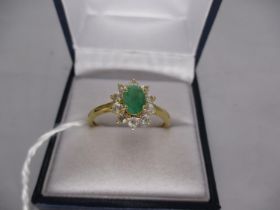 Emerald and White Topaz Ring