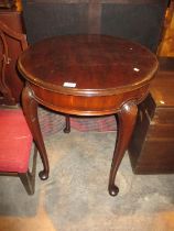 Mahogany Occasional Table and an Eastern Rug