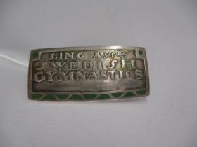 Arts & Crafts Silver and Enamel Rectangular Brooch inscribed 'Ling Assoc., Swedish Gymnastics', by