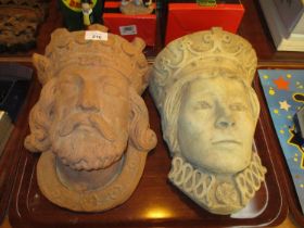 Two Cast Pottery Mask Plaques