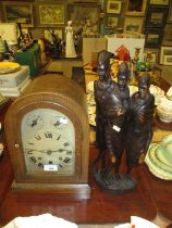Oak Mantel Clock and a Carved Wood African Figure Group
