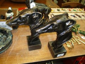 Two Cast Greyhound Heads